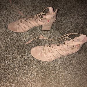 Gently used cute gladiator low heel sandals size 7